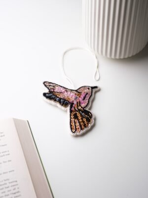 ميدالية مطرّزة - Hand-Embroidered Charm