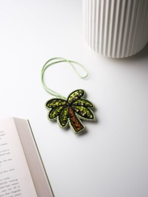 ميدالية مطرّزة - Hand-Embroidered Charm