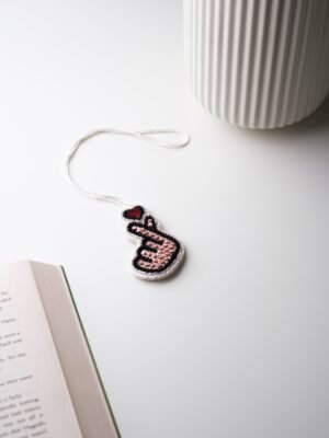 ميدالية مطرّزة - Hand-Embroidered Charm