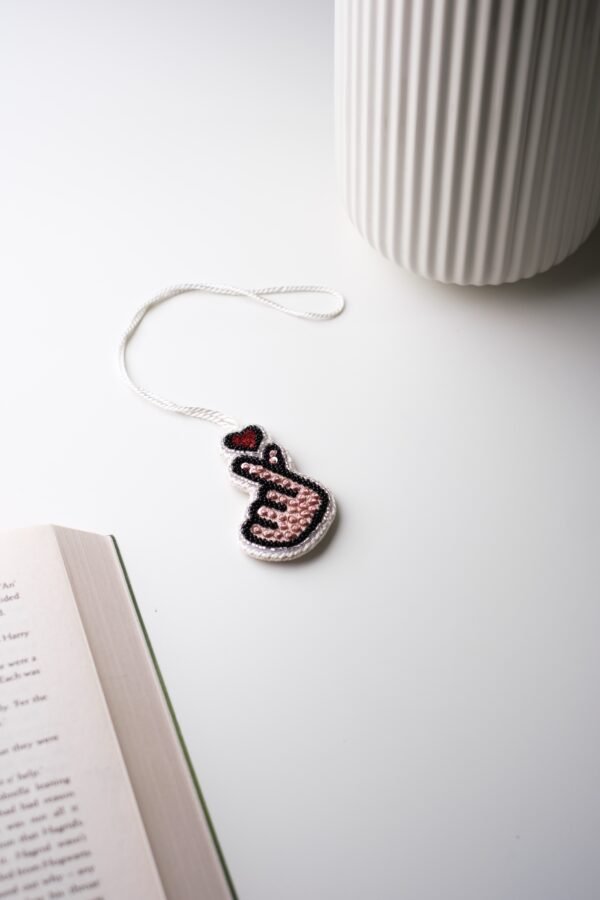 ميدالية مطرّزة - Hand-Embroidered Charm