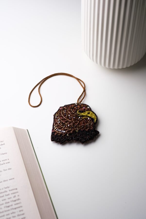 ميدالية مطرّزة - Hand-Embroidered Charm